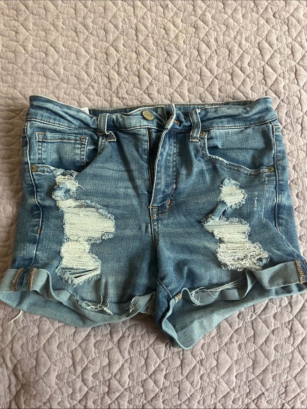 Aero Mid-Rise Distressed Denim Shorts in Light Blue